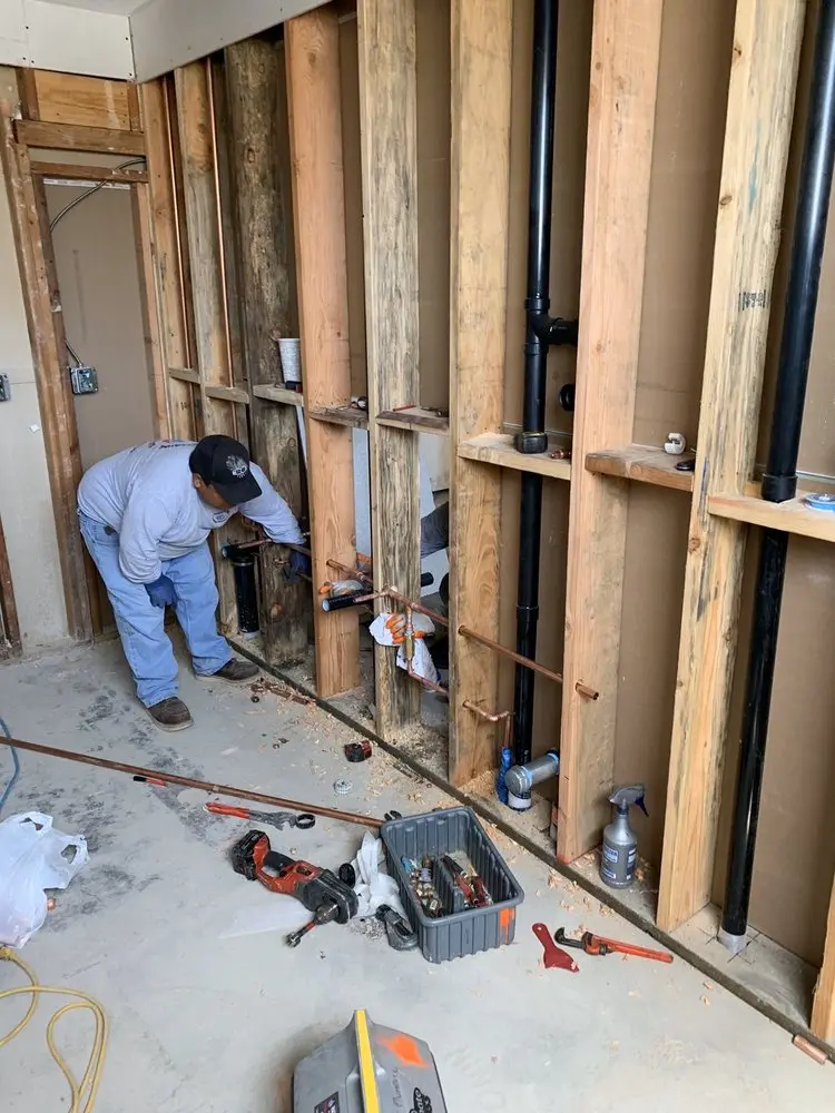 Commercial rough-in plumbing for Water Heater Replacement in Cedar Land